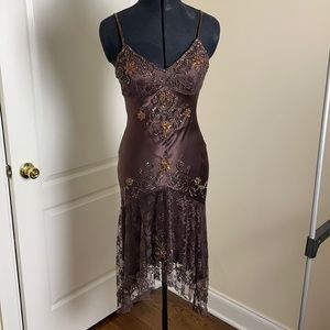 Satin Cache’ lacey beaded dress.